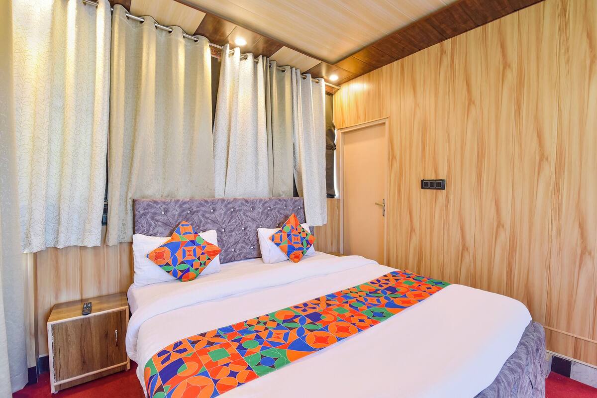 Habitación familiar | Sábanas de algodón egipcio y ropa de cama de alta calidad