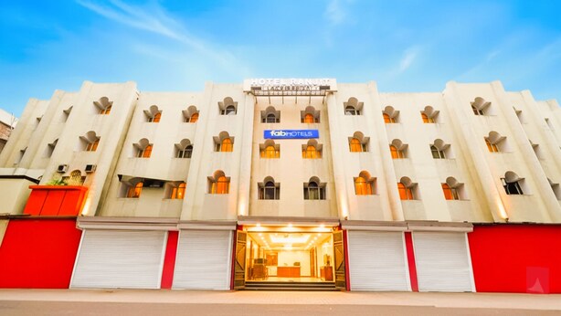 A hotel with a modern facade, multiple balconies, and a prominent sign for 'Hotel Ranjiit'. - Fabhotel Ranjit Residency (Hyderabad)