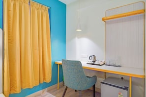 Deluxe Room | Living area | 28-inch LCD TV with cable channels - Fabhotel Slr Residency (Bangalore)