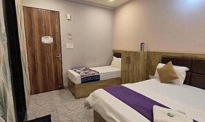 家庭房 | 埃及棉床单、高档床上用品、客房内保险箱、免费 WiFi