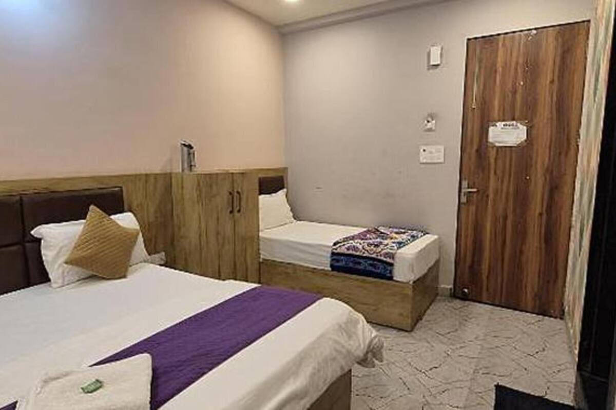 Habitación familiar | Sábanas de algodón egipcio y ropa de cama de alta calidad