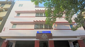 A hotel with a sign for 'Fab Hotels' and 'Vivek Inn' indicating a luxury stay. - Fabhotel Vivek Inn (Prayagraj)