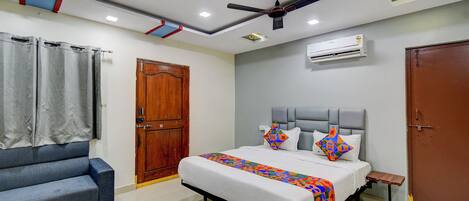 Chambre Prestige | Draps en coton égyptien, literie de qualité, coffre-fort