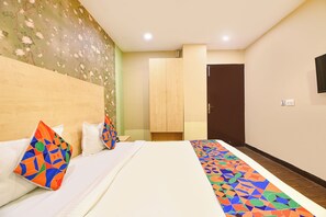 Deluxe kamer | Lakens van Egyptisch katoen, luxe beddengoed, een kluis op de kamer