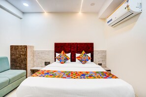 Deluxe kamer | Lakens van Egyptisch katoen, luxe beddengoed, een kluis op de kamer