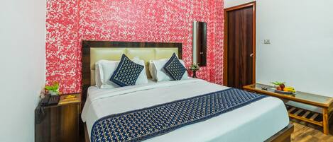 Chambre Deluxe | Draps en coton égyptien, literie de qualité, coffre-fort