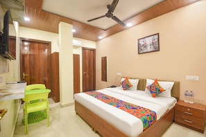 Chambre Deluxe | Draps en coton égyptien, literie de qualité, coffre-fort