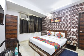 Habitación Deluxe | Sábanas de algodón egipcio, ropa de cama de alta calidad, caja fuerte