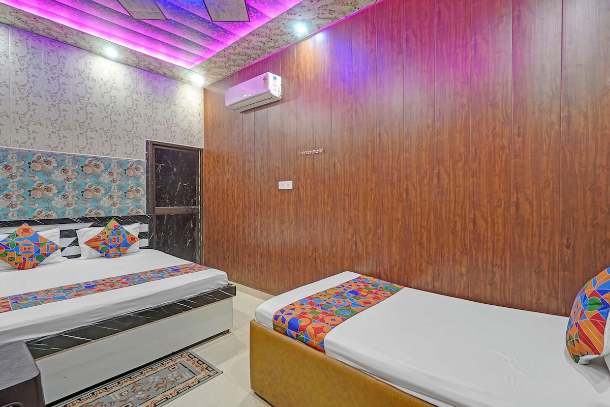 Habitación familiar | Sábanas de algodón egipcio y ropa de cama de alta calidad