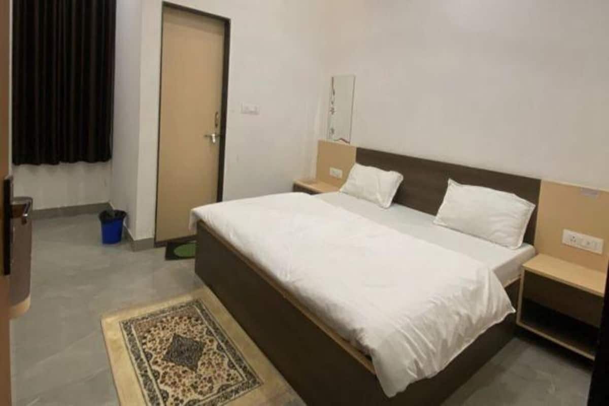 Deluxe kamer | Lakens van Egyptisch katoen, luxe beddengoed, een kluis op de kamer