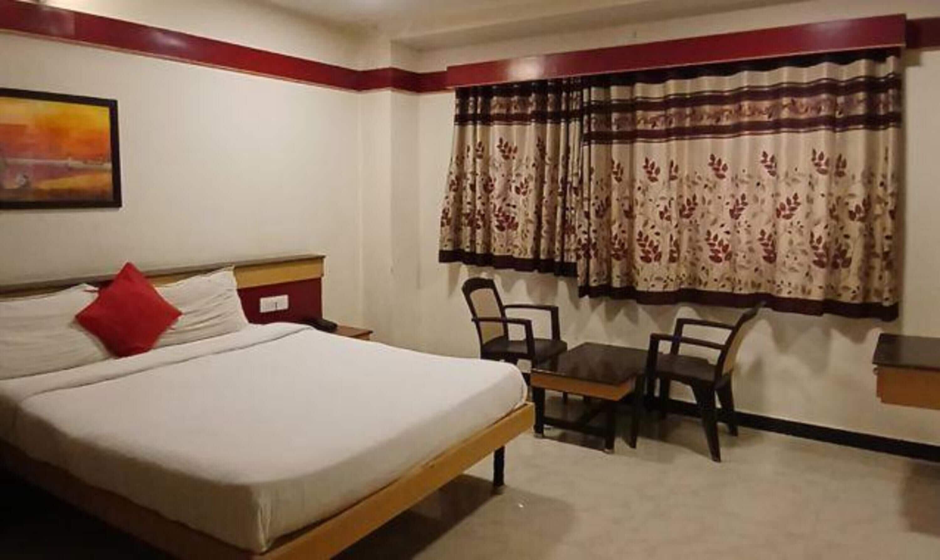 Habitación Deluxe | Sábanas de algodón egipcio y ropa de cama de alta calidad 