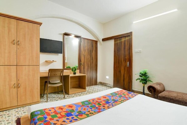 Chambre Deluxe | Draps en coton égyptien, literie de qualité, coffre-fort