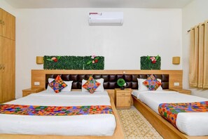 Family Room | Egyptian cotton sheets, premium bedding, in-room safe, free WiFi - Fabhotel A2 (Barasat)