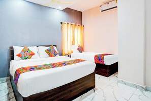 Egyptian cotton sheets, premium bedding, in-room safe, free WiFi - Fabhotel Aranya Residency (Bengaluru)