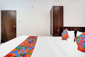 Egyptian cotton sheets, premium bedding, in-room safe, free WiFi - Fabhotel Pride Image (Bangalore)