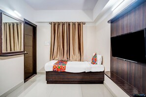 Egyptian cotton sheets, premium bedding, in-room safe, free WiFi - Fabhotel Pride Image (Bangalore)