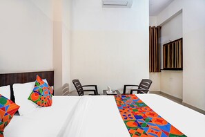 Egyptian cotton sheets, premium bedding, in-room safe, free WiFi - Fabhotel Pride Image (Bangalore)