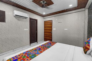 Egyptian cotton sheets, premium bedding, in-room safe, free WiFi - Fabhotel Vrishti Residency (Greater Noida)