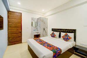 Habitación Deluxe | Sábanas de algodón egipcio y ropa de cama de alta calidad