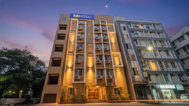 A multi-story building with a sign reading "faab hotels". - Fabhotel Jaswitha Grand (Hyderabad)