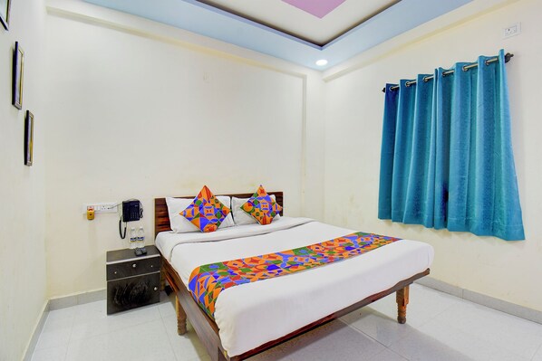 ห้องดีลักซ์ | ผ้าปูที่นอนฝ้ายอียิปต์, เครื่องนอนระดับพรีเมียม, ตู้นิรภัยในห้องพัก