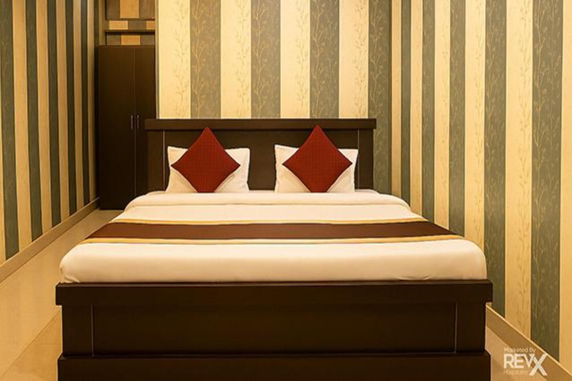 Chambre Deluxe | Draps en coton égyptien, literie de qualité, coffre-fort