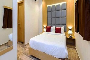Deluxe kamer | Lakens van Egyptisch katoen, luxe beddengoed, een kluis op de kamer