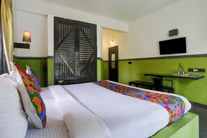 ห้องดีลักซ์ | ผ้าปูที่นอนฝ้ายอียิปต์, เครื่องนอนระดับพรีเมียม, ตู้นิรภัยในห้องพัก