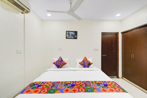 Egyptian cotton sheets, premium bedding, in-room safe, free WiFi - Fabhotel Vsm Suites (Hyderabad)