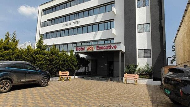 A hotel building with a sign reading "Hotel ACE Executive". - Fabhotel Ace Executive (Pune)
