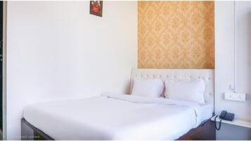 Deluxe Room | Egyptian cotton sheets, premium bedding, in-room safe, free WiFi