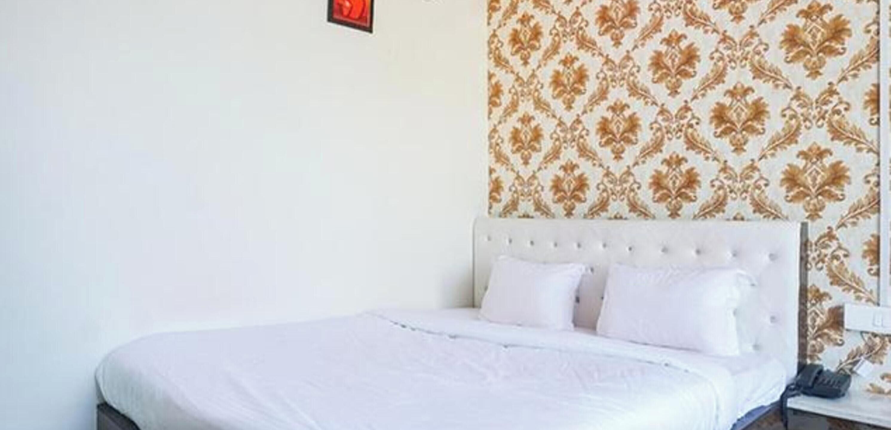 Habitación Deluxe | Sábanas de algodón egipcio y ropa de cama de alta calidad 