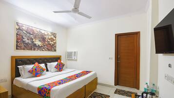 Habitación Deluxe | Sábanas de algodón egipcio, ropa de cama de alta calidad, caja fuerte