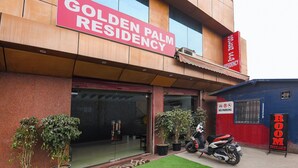 A building with a sign reading "Golden Palm Residency." - Fabhotel Golden Palm (New Delhi)