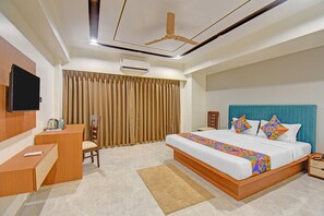 ห้องดีลักซ์ | ผ้าปูที่นอนฝ้ายอียิปต์, เครื่องนอนระดับพรีเมียม, ตู้นิรภัยในห้องพัก