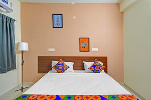 Egyptian cotton sheets, premium bedding, in-room safe, free WiFi - Fabhotel Aashray (Hyderabad)