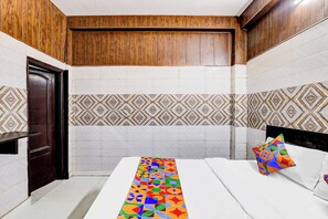 Deluxe Room | Egyptian cotton sheets, premium bedding, in-room safe, free WiFi - Fabhotel Csrx (Ghaziabad)