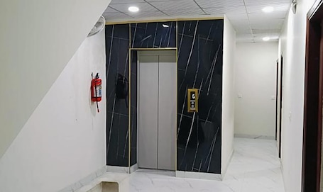 Lift. Fabhotel Radha Madhav