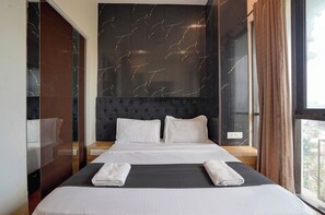 Lakens van Egyptisch katoen, luxe beddengoed, een kluis op de kamer