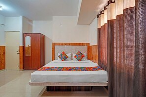 Habitación Deluxe | Sábanas de algodón egipcio, ropa de cama de alta calidad, caja fuerte