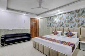 ห้องดีลักซ์ | ผ้าปูที่นอนฝ้ายอียิปต์, เครื่องนอนระดับพรีเมียม, ตู้นิรภัยในห้องพัก