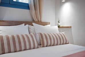 Tabla de planchar con plancha, wifi gratis y ropa de cama 