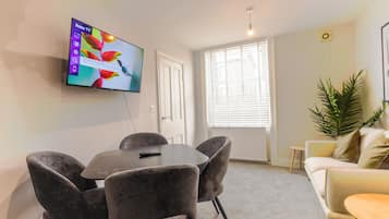 Family Apartment, 3 Bedrooms, Non Smoking | Living area | TV