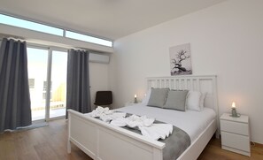 Apartemen, 3 kamar tidur, AC, pemandangan kota | Setrika/meja setrika dan Wi-Fi gratis