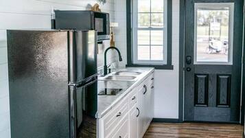 Microwave, stovetop, coffee/tea maker, toaster