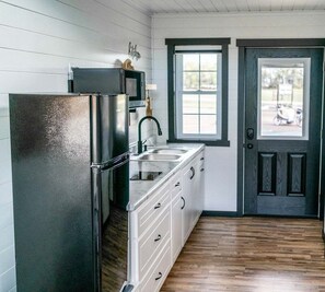 Microwave, stovetop, coffee/tea maker, toaster