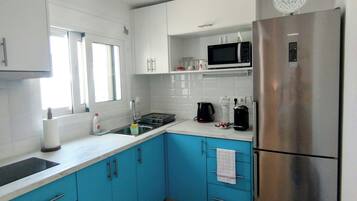 Apartment, Sea View | Private kitchen | Microwave, stovetop, espresso maker, electric kettle
