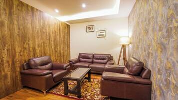 Chambre Exécutive | Coin séjour