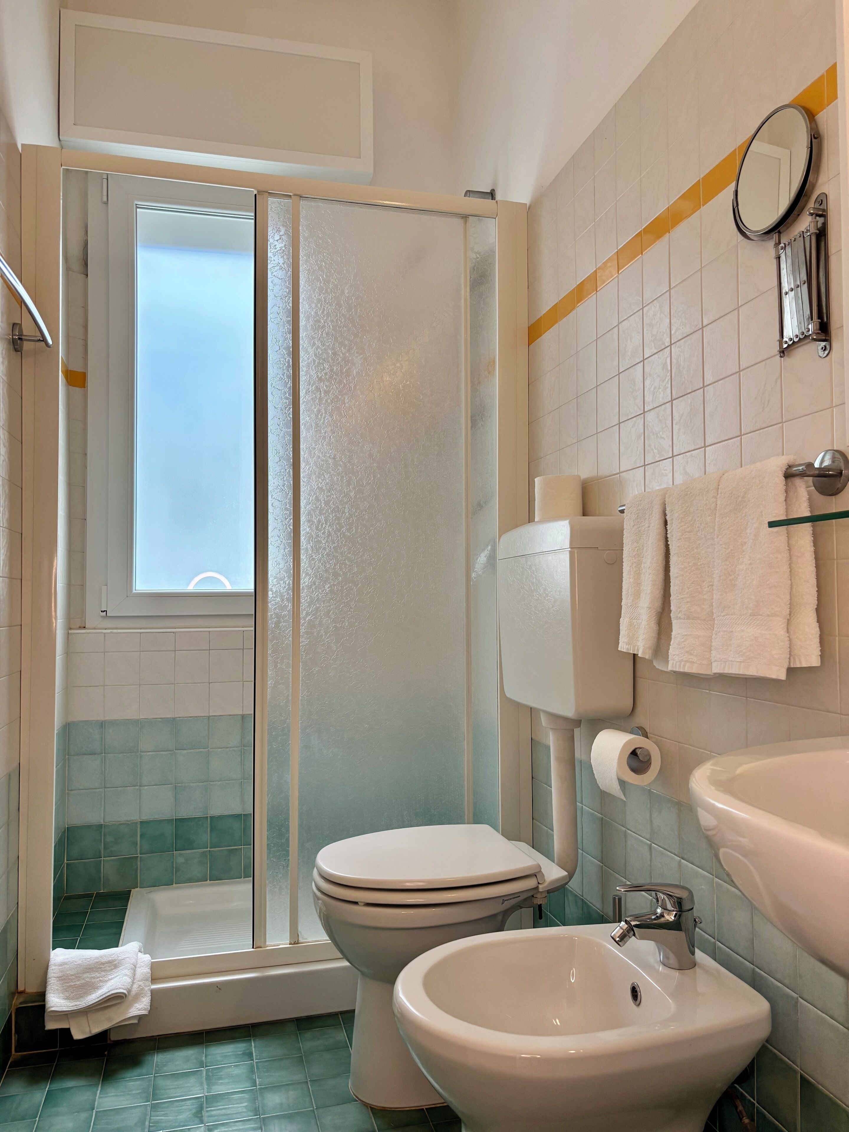 Shower, free toiletries, hair dryer, towels