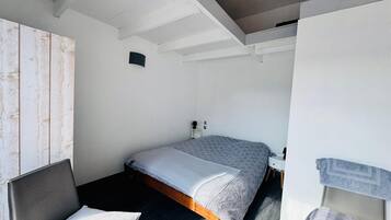 1 chambre, fer et planche Ă repasser, Wi-Fi, draps fournis